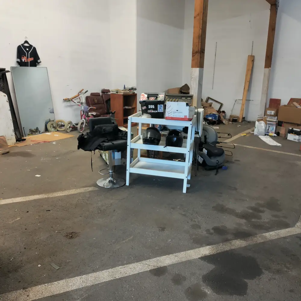 Warehouse cleanout in progress with remaining items staged to load in Kingwood, OR