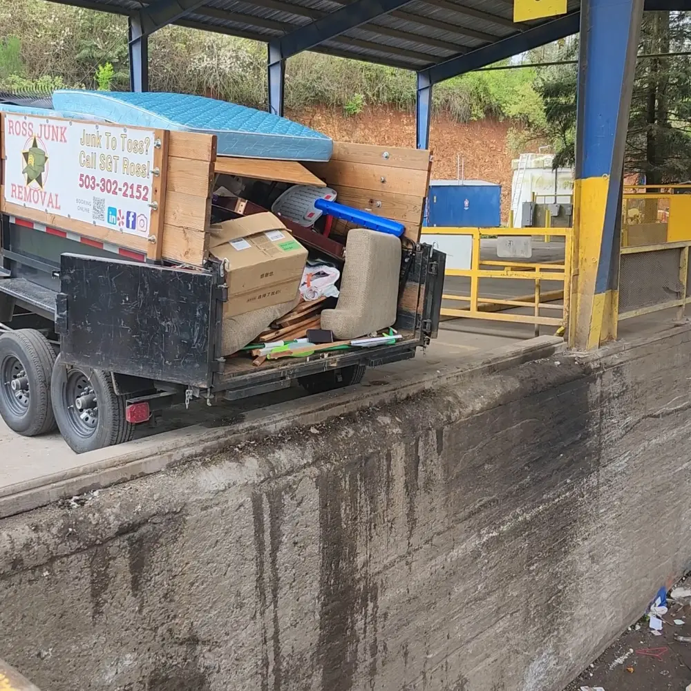Loaded Ross Junk Removal trailer at the transfer station after a Doaks Ferry haul
