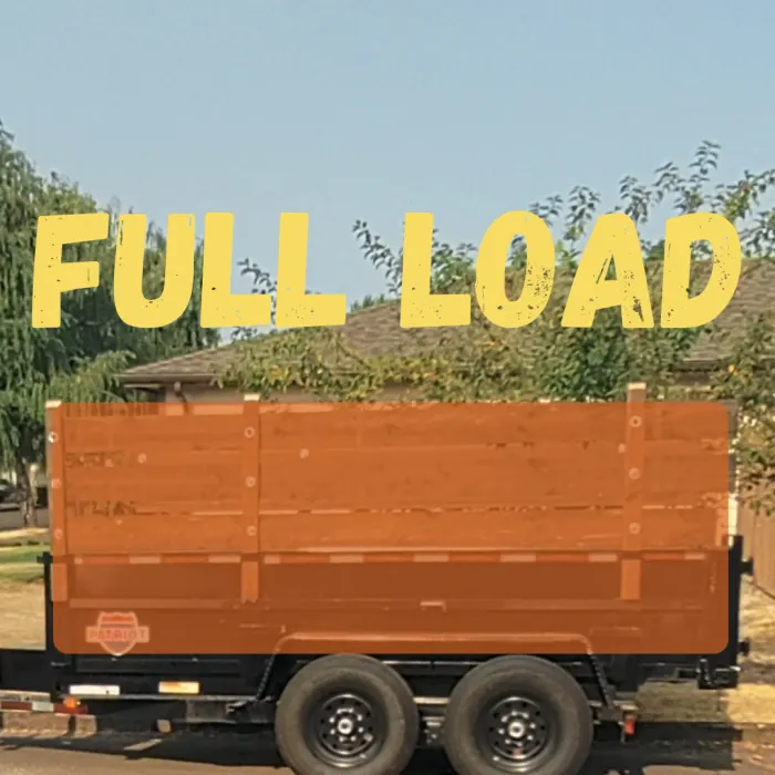 Ross Junk Removal dump trailer filled to a full load