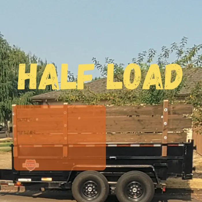 Ross Junk Removal dump trailer filled to a half load