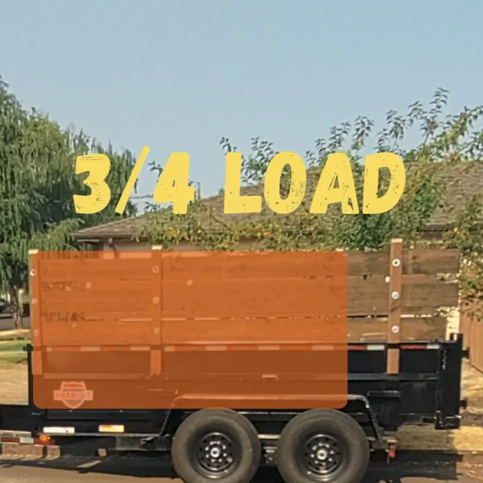 Ross Junk Removal dump trailer filled to a three-quarter load